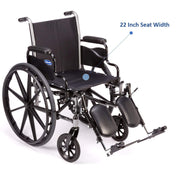 Black wheelchair with leg rests and note saying there is 22 inch seat width